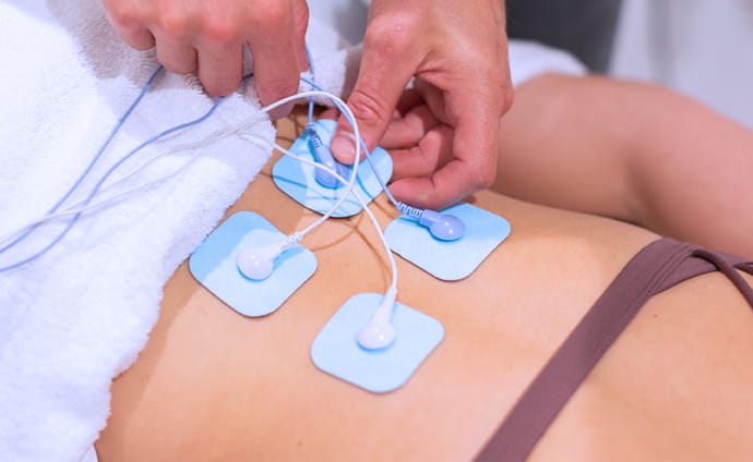 tents machine treatment on a patients lower-back