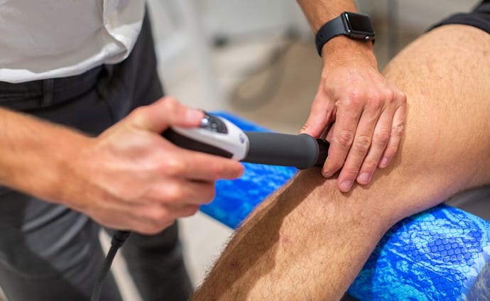 Shockwave Therapy treatment to patients knee