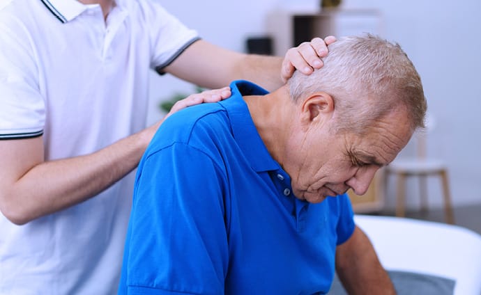 Elderly physio patient undergoing treatment following a fall