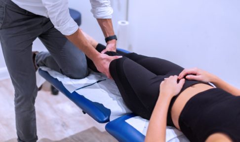 Physio patient undergoing treatment following a knee injury